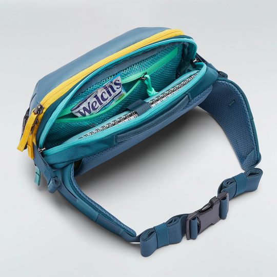 Allpa X 3L Hip Pack by Cotopaxi with quick access, compression straps, and unique llama logo design.