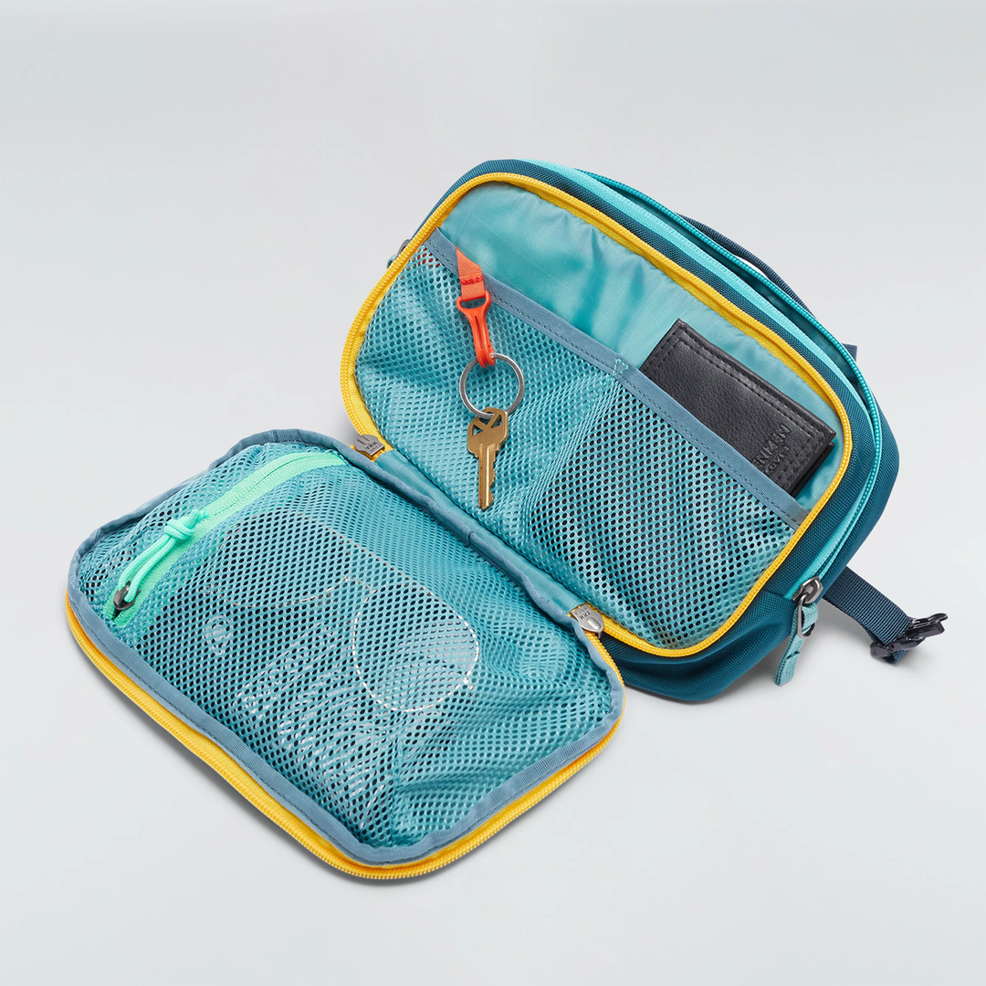 Allpa X 3L Hip Pack in teal with organized compartments and key attachment.