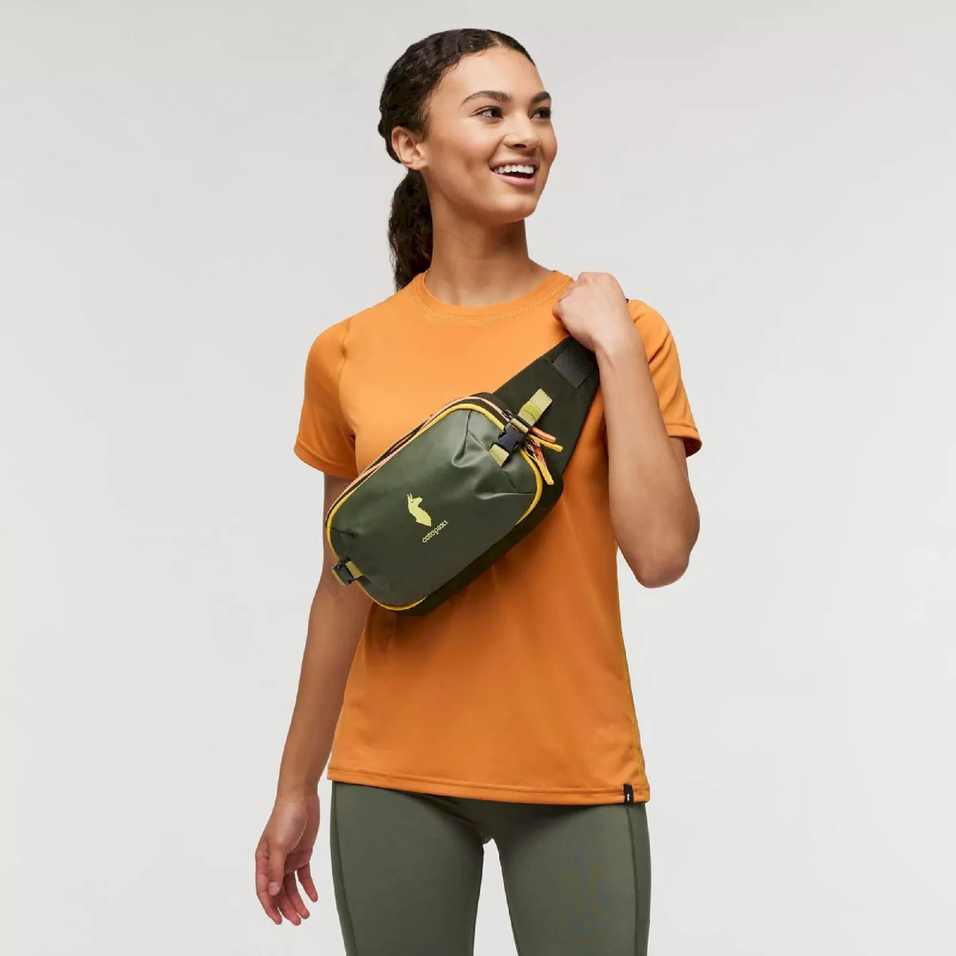 Allpa X 3L Hip Pack worn by person, showcasing easy access design and unique llama logo.