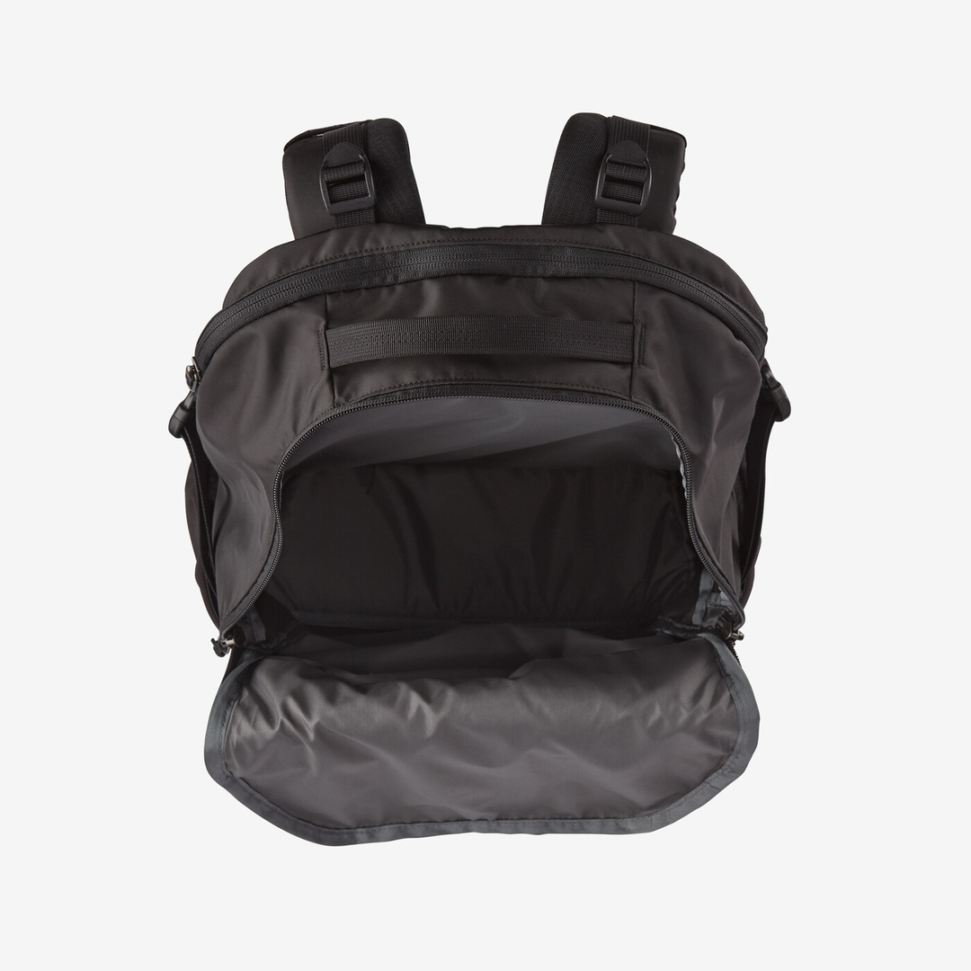 Refugio Day Pack 30L with open compartment, black recycled polyester, Fair Trade Certified, padded laptop sleeve, hydration loop, bike light clip.