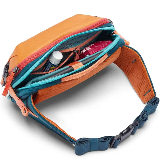 Allpa X 3L Hip Pack by Cotopaxi, open compartment, colorful design, ideal for essentials, sustainable materials.