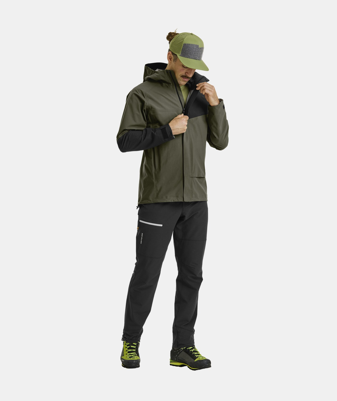 SECEDA 3L Jacket M, versatile hardshell for mountain use, shown in green with adjustable hood and ergonomic fit.