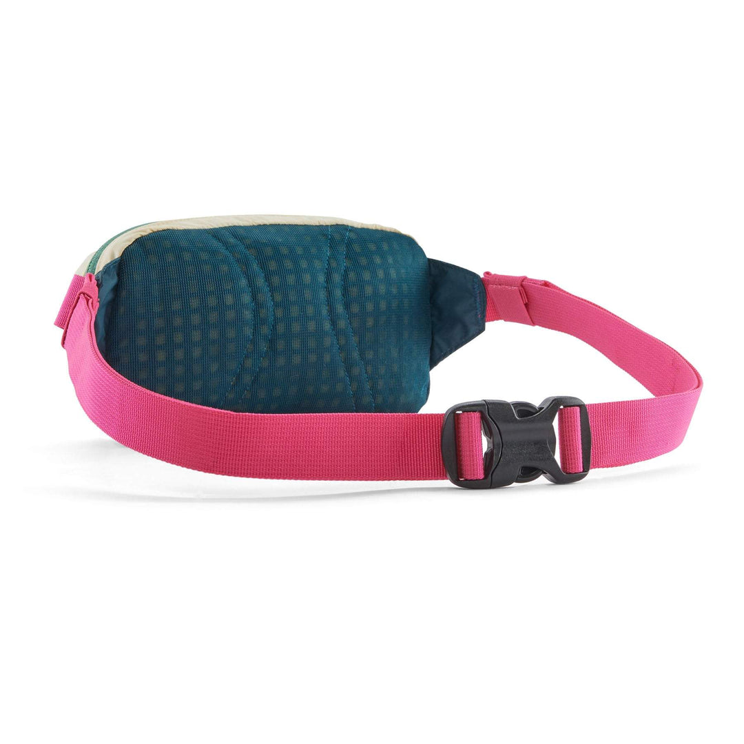 Lightweight Terravia Mini Hip Pack with pink strap and durable blue mesh back.