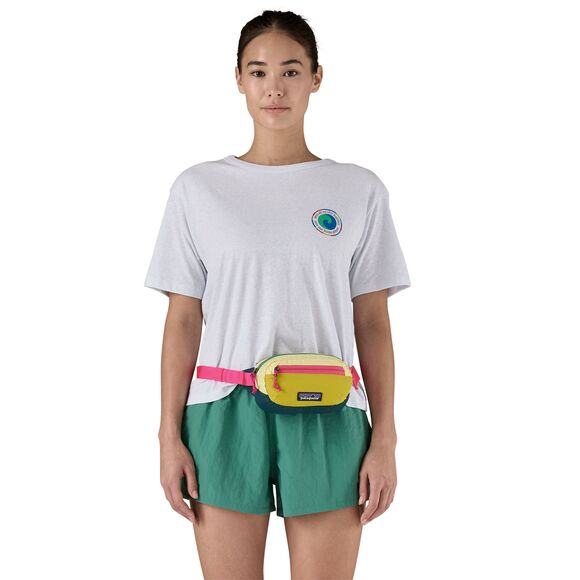 Terravia Mini Hip Pack on model, yellow and pink, lightweight and water-repellent, versatile for daily and adventure use.