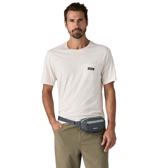 Terravia Mini Hip Pack worn by man, lightweight and durable design, versatile for daily use.