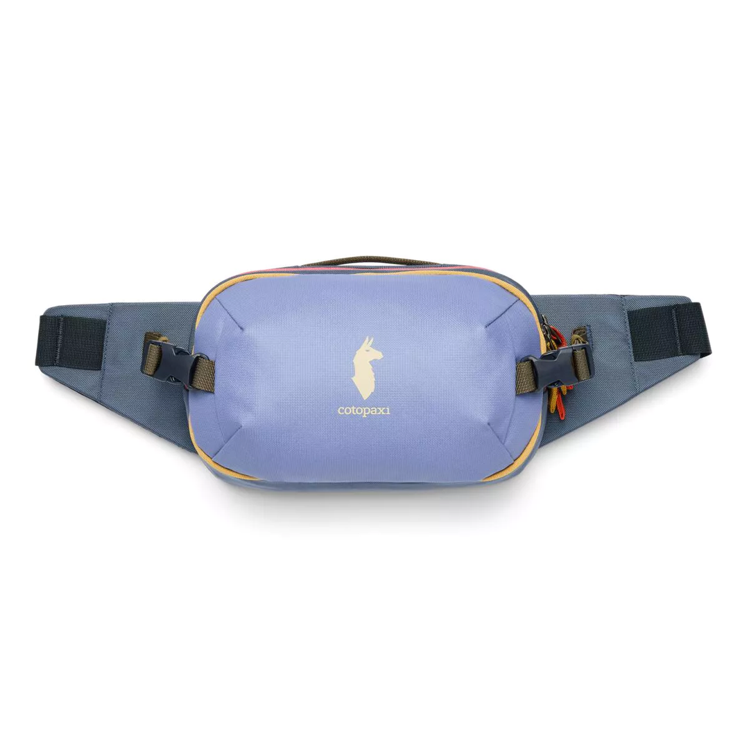 Cotopaxi Allpa X 3L Hip Pack in blue, featuring compression straps and a main zippered compartment.