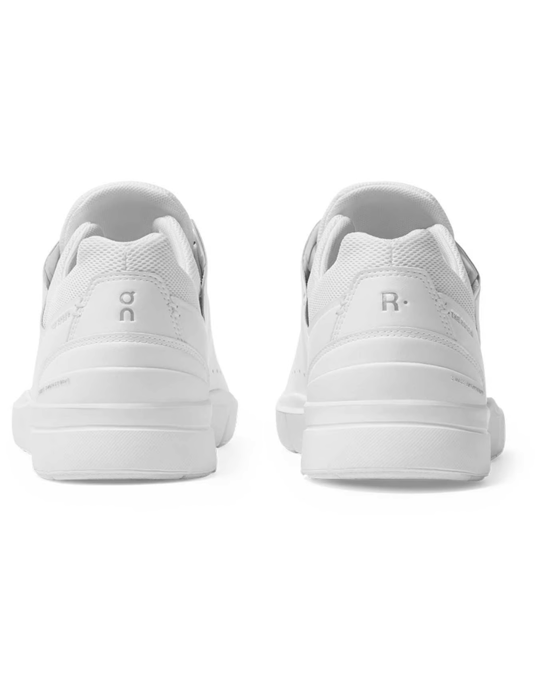 The Roger Advantage white sneakers with logo on heel viewed from the back.