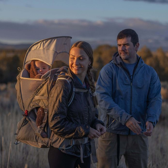 Lightweight Poco LT baby carrier backpack with sunshade, ideal for outdoor adventures.