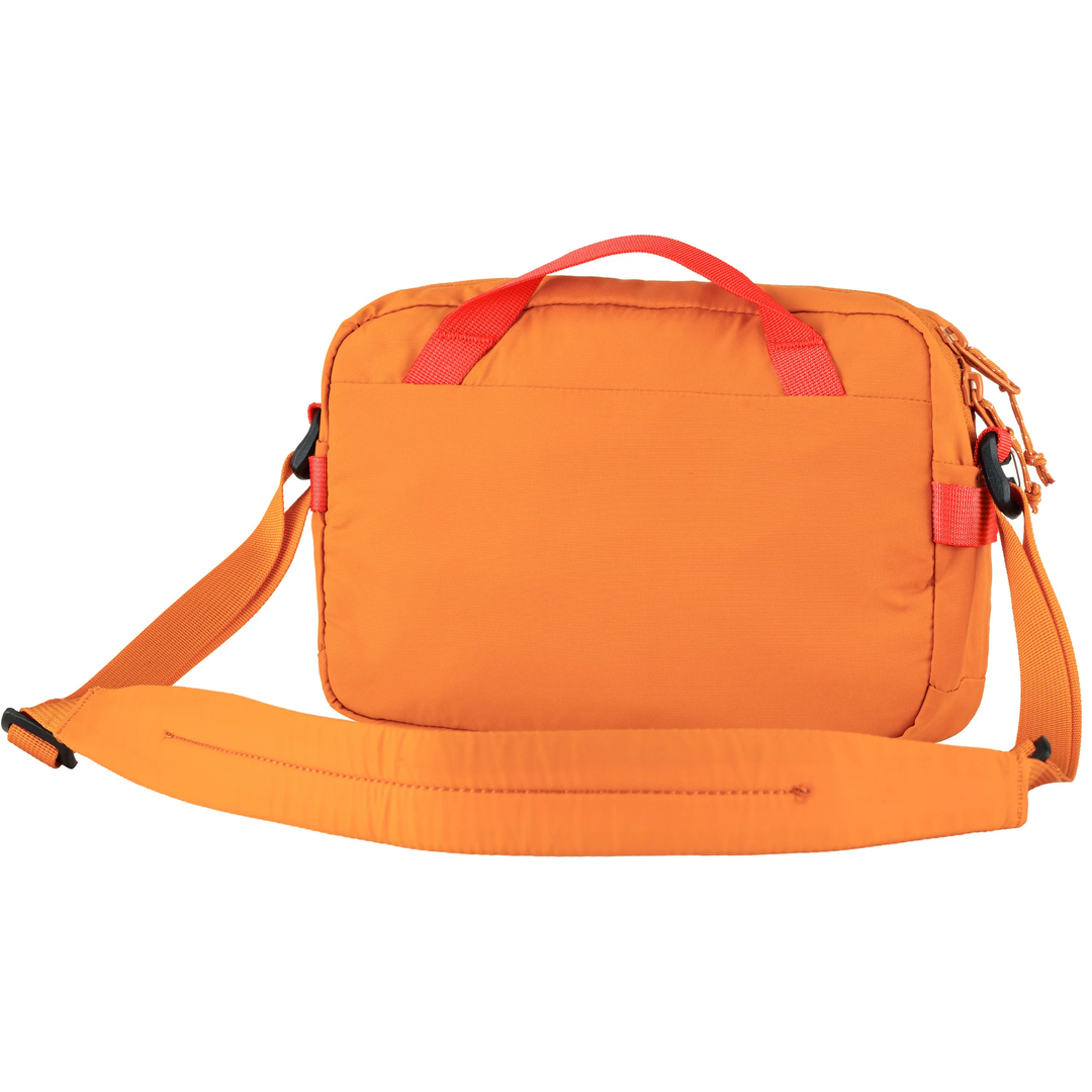 High Coast Crossbody bag, orange with adjustable strap, lightweight, 3-liter capacity, recycled polyamide.