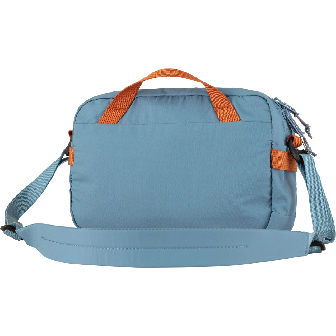 High Coast Crossbody bag in blue with orange handles and adjustable strap.