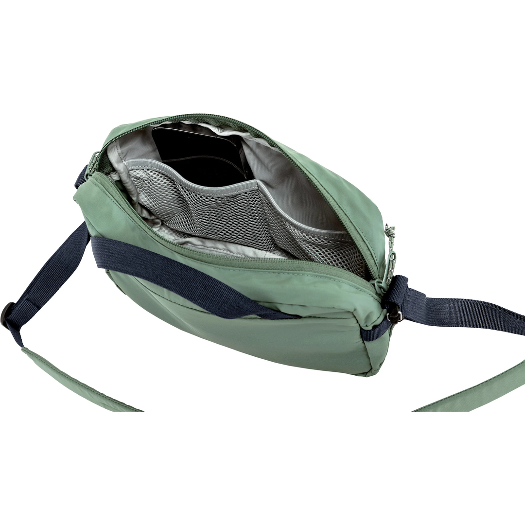 High Coast Crossbody bag in green with adjustable strap and multiple pockets.