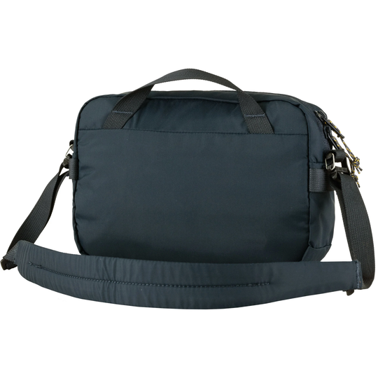 High Coast Crossbody bag in black with adjustable padded strap, front zipper pocket, side gear loops.