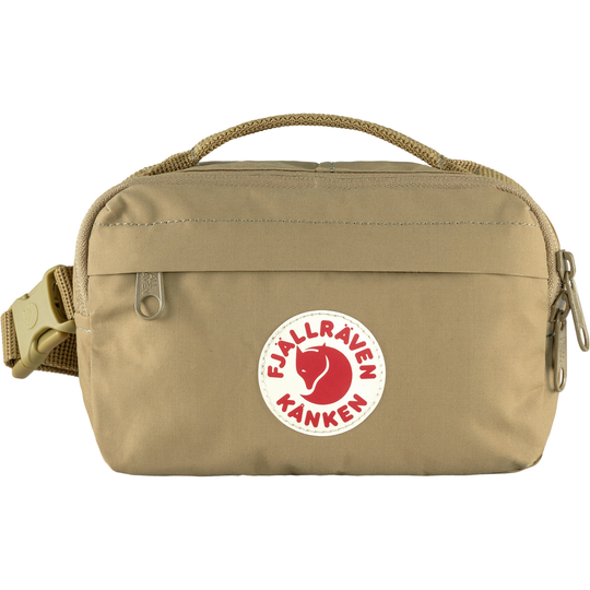 Kånken Hip Pack in beige with adjustable belt, durable waterproof Vinylon F fabric, and multiple zipper pockets.