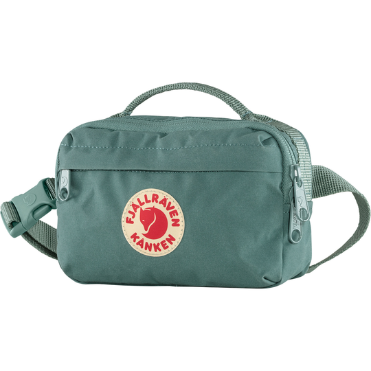 Kånken Hip Pack in green, made of durable, waterproof Vinylon F fabric with adjustable belt.