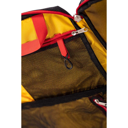 Travel bag with multiple internal compartments and large zip opening.