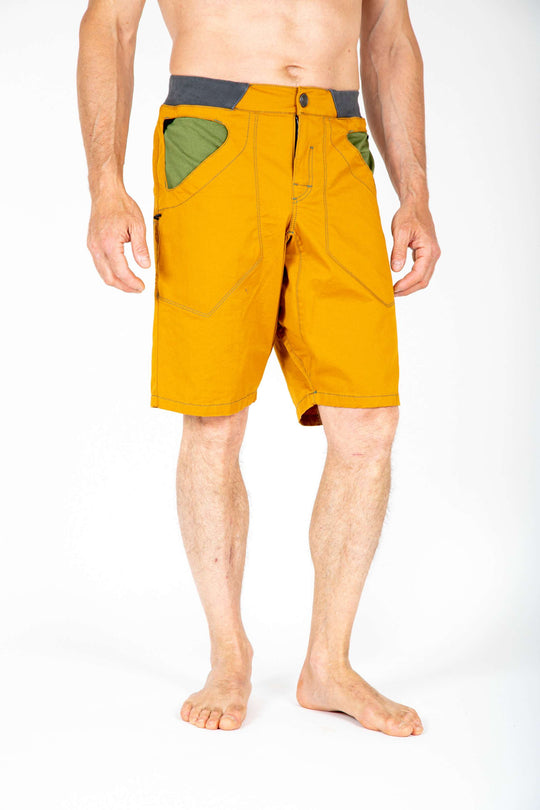 Urban climbing shorts with adjustable waist and brush holders, made from organic cotton gabardine.