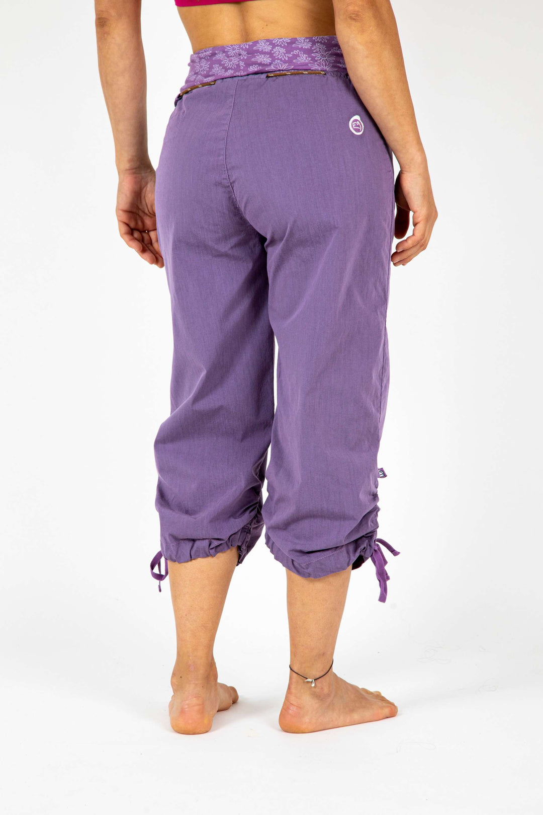 Cleo 2 purple outdoor climbing pants with embroidered details, made in Italy.
