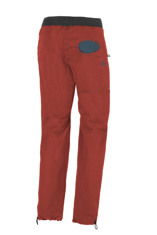 Outdoor climbing pants in organic cotton gabardine with adjustable features.