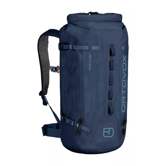 Blue Trad 30 Dry climbing backpack with waterproof material, helmet holder, and ergonomic back system.