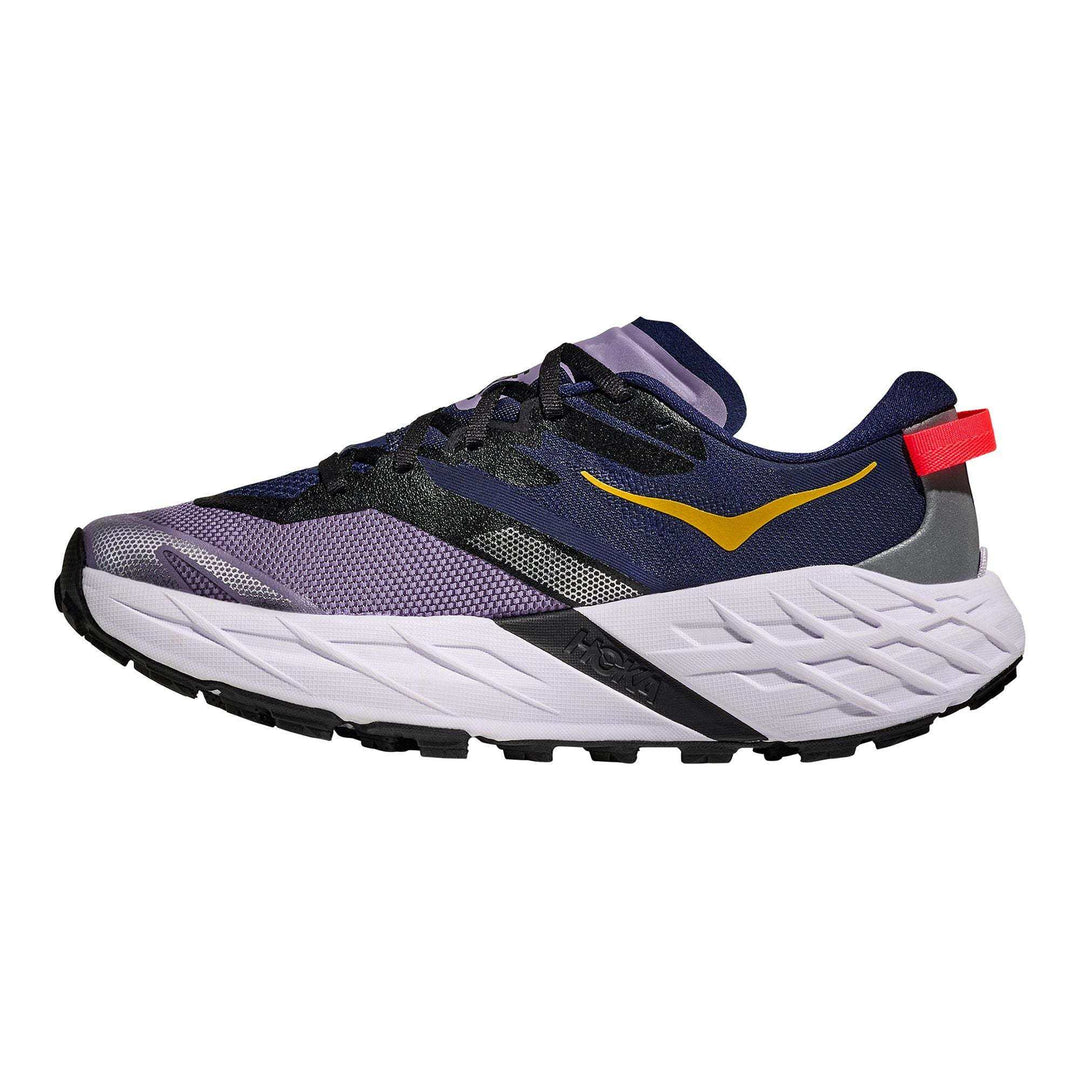 W Speedgoat 7 trail running shoe with Vibram sole, integrated gaiter, and high traction for technical terrains