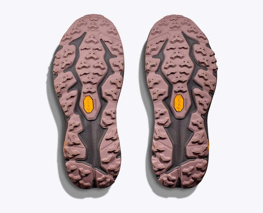 Soles of Speedgoat 6 GTX shoes with Vibram Megagrip and Traction Lug for trail and hiking.