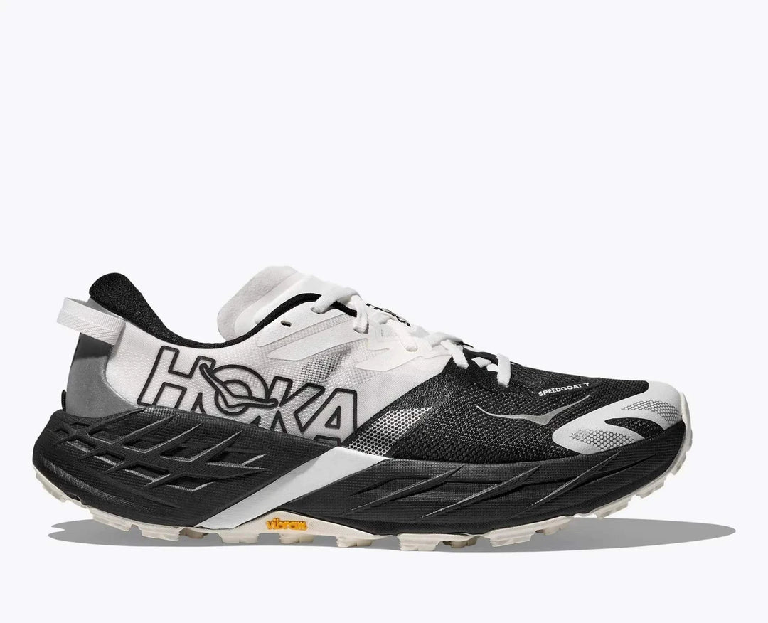 W Speedgoat 7 trail running shoe with Vibram Megagrip sole and integrated gaiter for enhanced traction and comfort