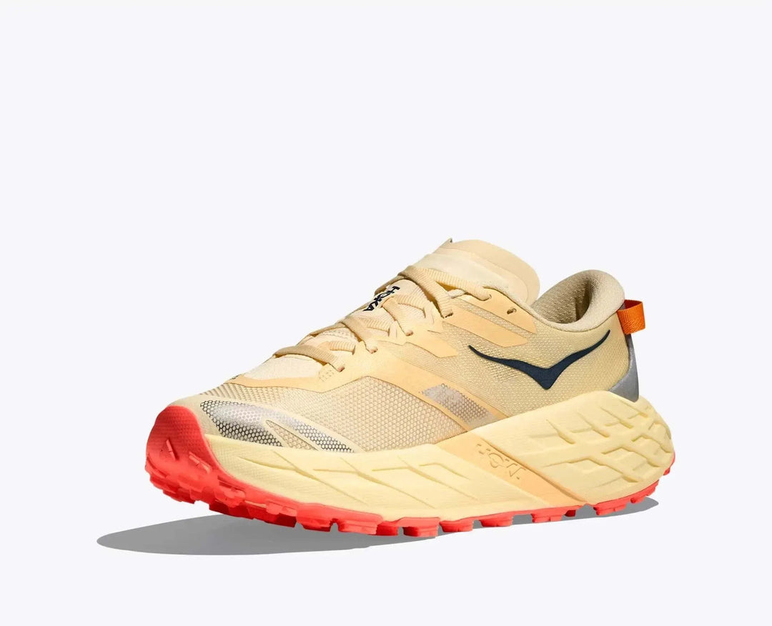 W Speedgoat 7 trail running shoe with Vibram Megagrip sole and integrated gaiter for technical terrain.