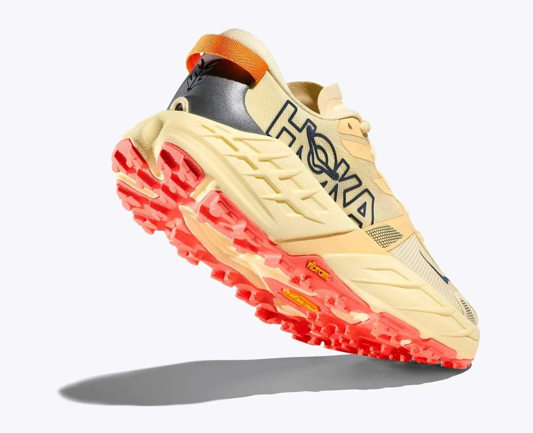 W Speedgoat 7 trail running shoe with Vibram Megagrip sole, integrated gaiter, and lightweight rPET fabric for enhanced traction and comfort on technical terrain