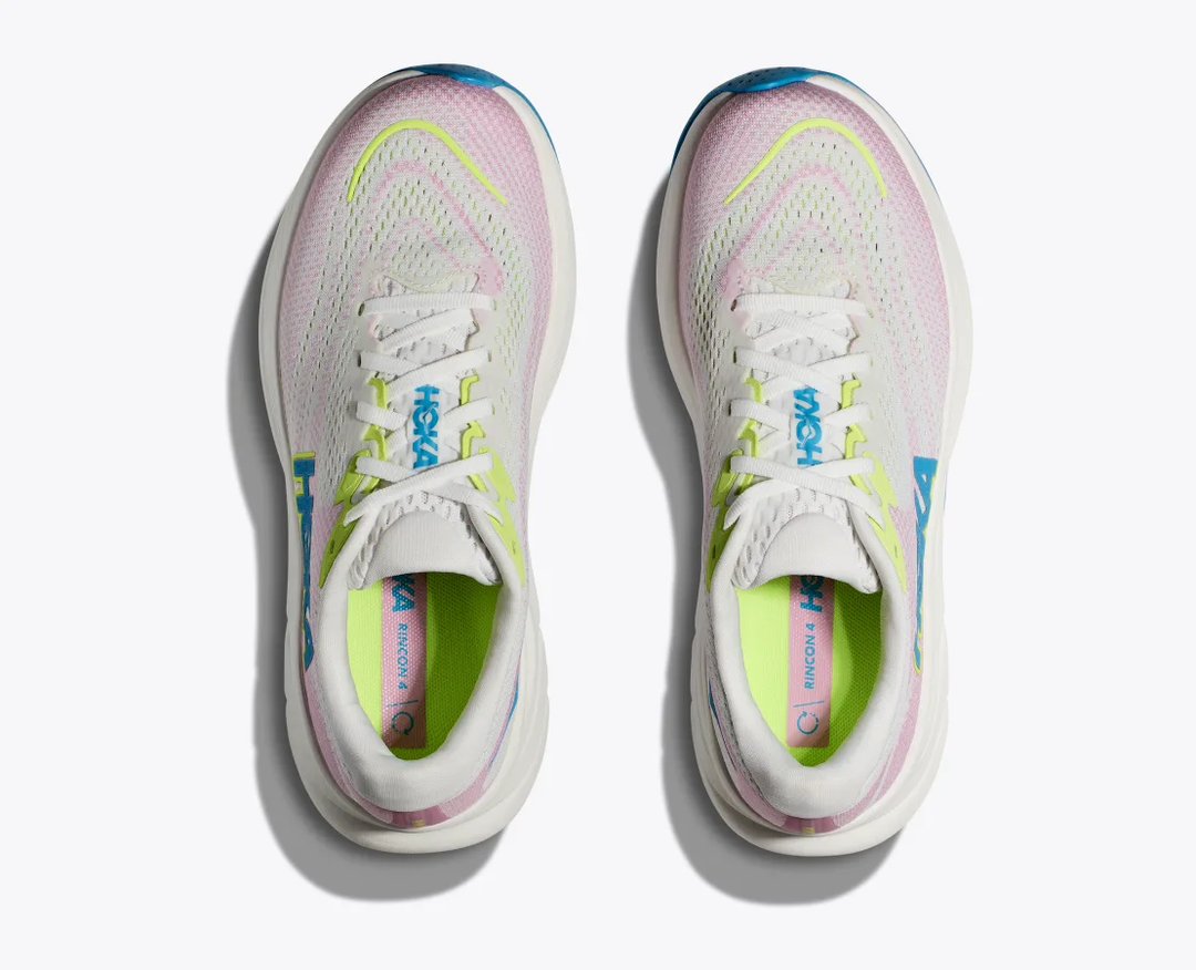 Lightweight Rincon 4 sneakers with pink and yellow accents, featuring breathable jacquard mesh and cushioned soles.