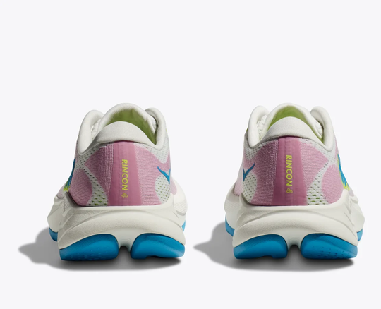 Rincon 4 running shoes rear view with blue soles and pink detailing.