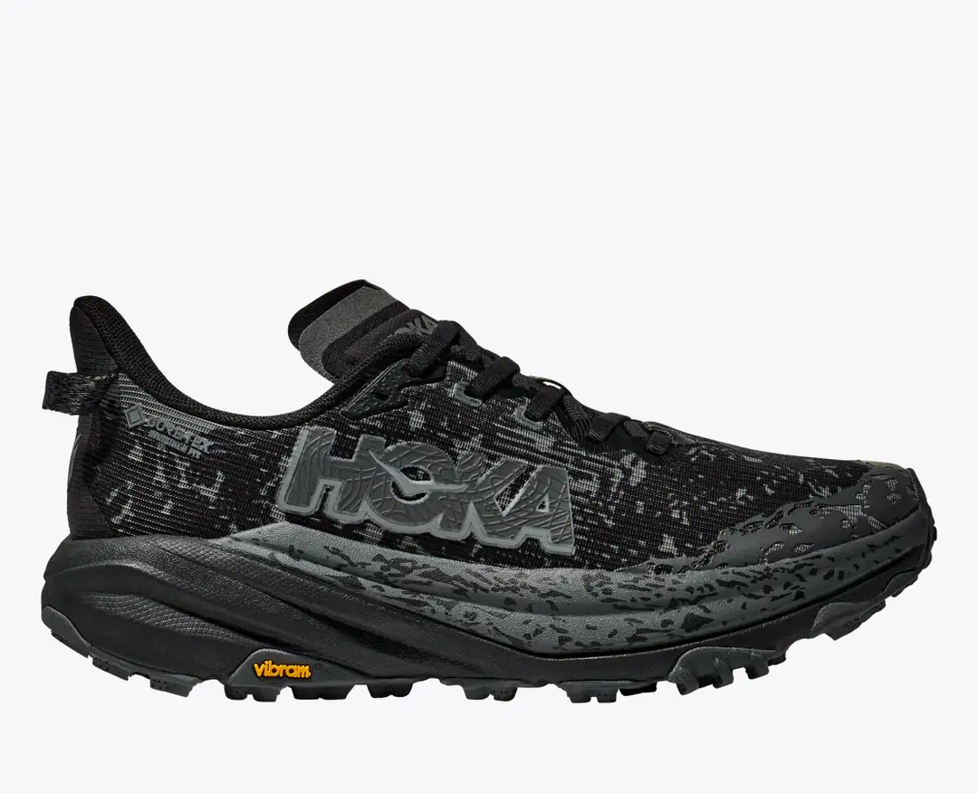 Trail running shoe Speedgoat 6 GTX with GORE-TEX, Vibram® Megagrip sole for traction, and reinforced heel for wet conditions.