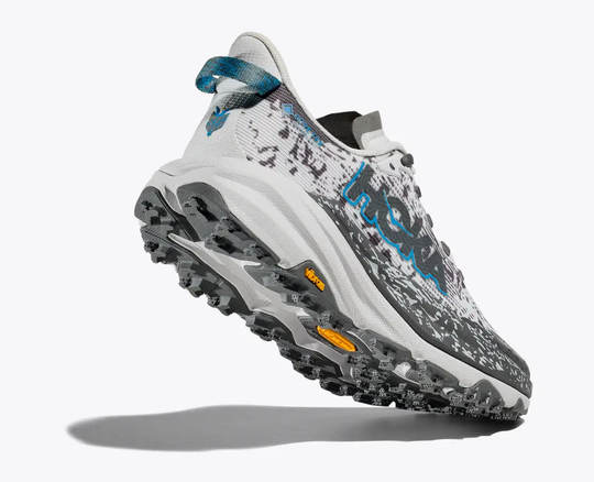 Trail shoe Hoka W Speedgoat 6 GTX, featuring GORE-TEX Invisible Fit and Vibram Megagrip sole for wet conditions.