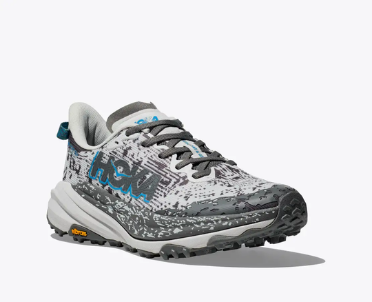 Speedgoat 6 Gtx trail shoe with Vibram Megagrip sole and GORE-TEX, designed for wet conditions.