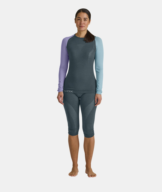Women's merino long sleeve top for intense activities, breathable and lightweight.