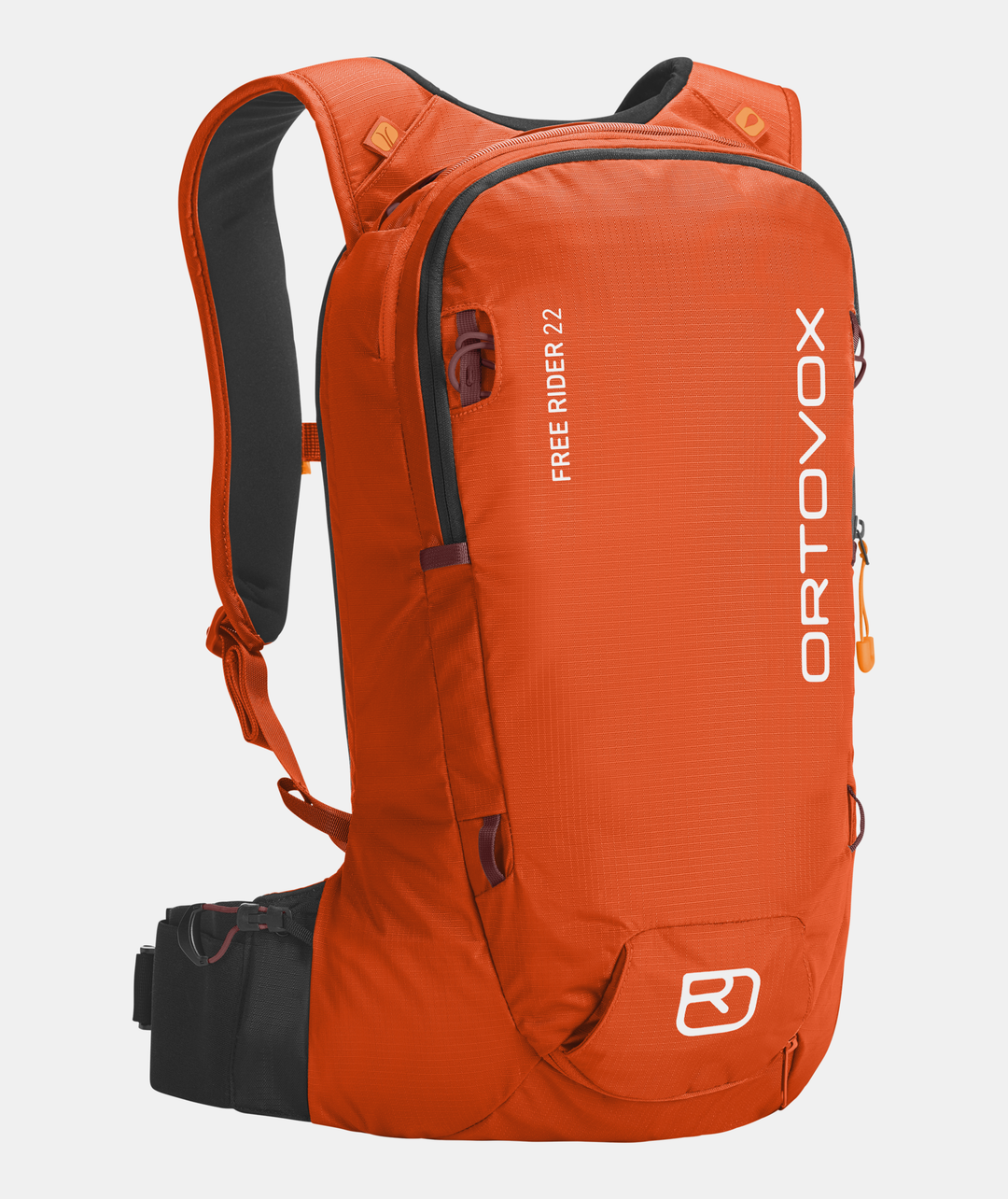 Compact and versatile Free Rider 22 backpack in orange, designed for freeride with ergonomic and flexible features, including integrated helmet net and safety compartments.