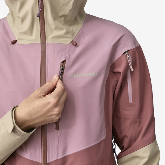 W's Snowdrifter Jkt in pink and beige, lightweight and flexible for backcountry conditions, made from 100% recycled polyester with H2No™ technology.