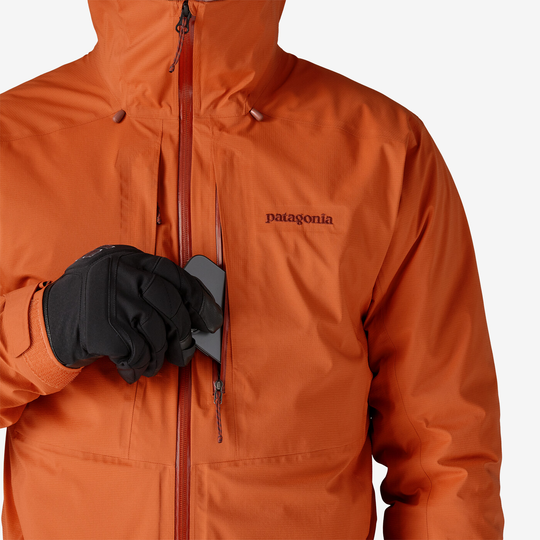 Orange M10 Storm Jkt with adjustable hood, waterproof zips, chest pocket.