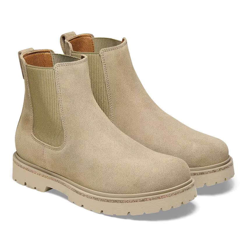 Suede leather women’s slip-on Chelsea boots with cork elements in the sole.