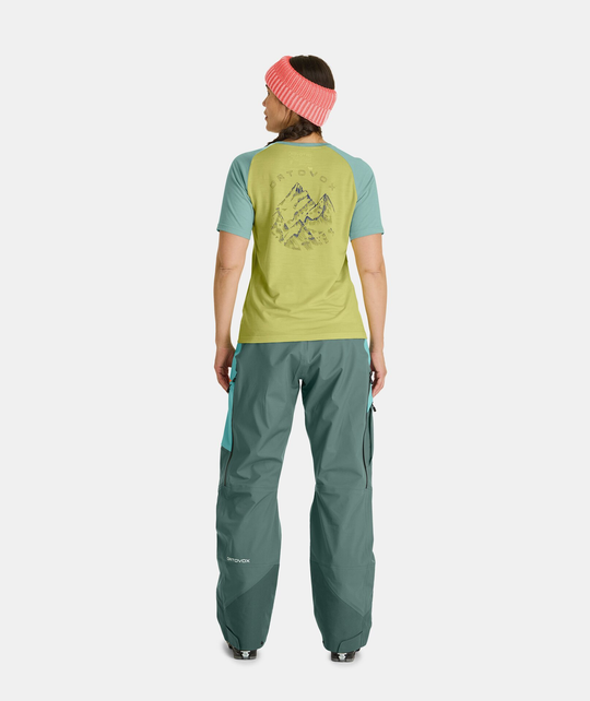 woman wearing 150 Cool Ballpen TS shirt and pants with mountain print in sporty style
