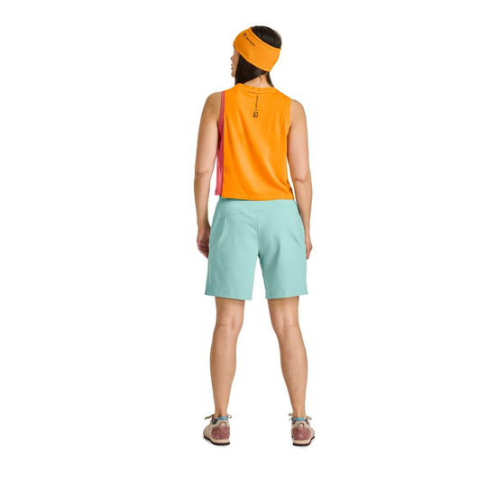 Women's 150 Cool Crack Top in orange and pink, loose fit, ideal for climbing, featuring Merino wool and TENCEL™ Lyocell for temperature regulation and durability.
