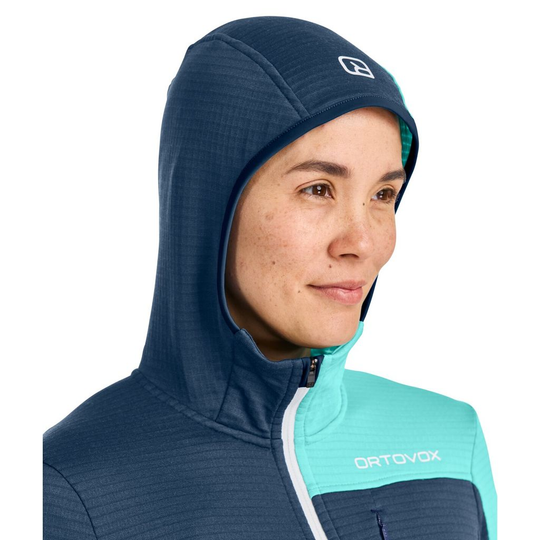 Fleece Light Grid Hooded Jacket for women, lightweight and insulated with Merino wool for alpine hiking.