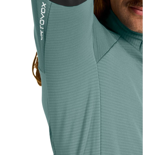 Men's Fleece Rib Jacket with Merino Shield Tec inserts for climbing.