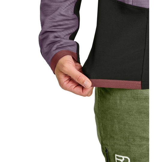Fleece Rib Jacket in use, showcasing flexible fabric and dual-tone design for climbing.