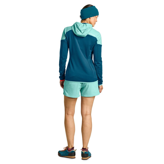 Ladiz Hybrid Jacket W in blue, featuring windproof inserts and Merino wool for alpine use.