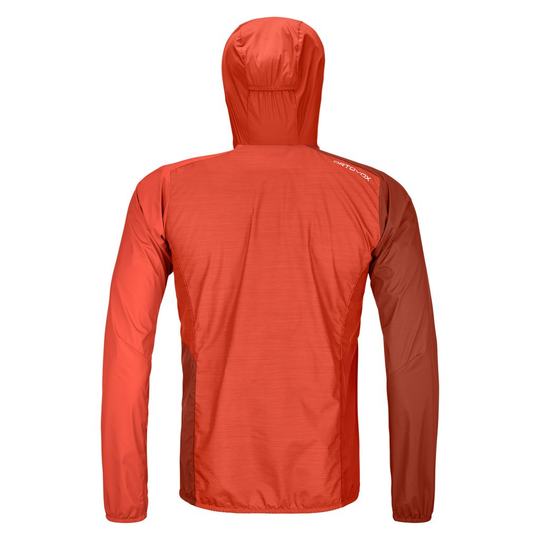 Ultralight men's windbreaker jacket with Merino wool, water-repellent, compact, ideal for alpine environments.