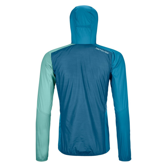 Lightweight and compact women's windbreaker jacket in blue with ergonomic design, featuring a self-adjusting hood and chest pocket.
