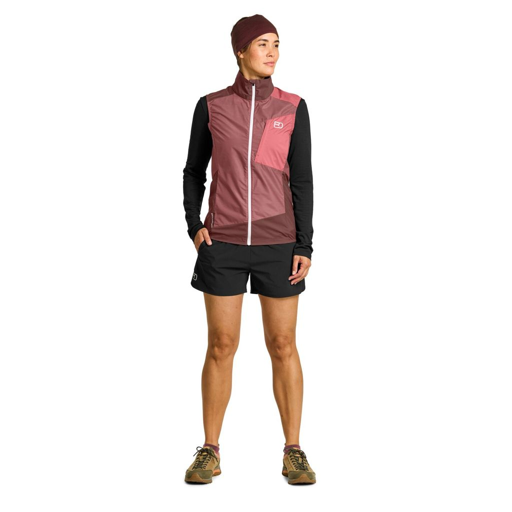 Women's windbreaker vest, lightweight, wind-resistant, Merino wool, pink design, outdoor wear.