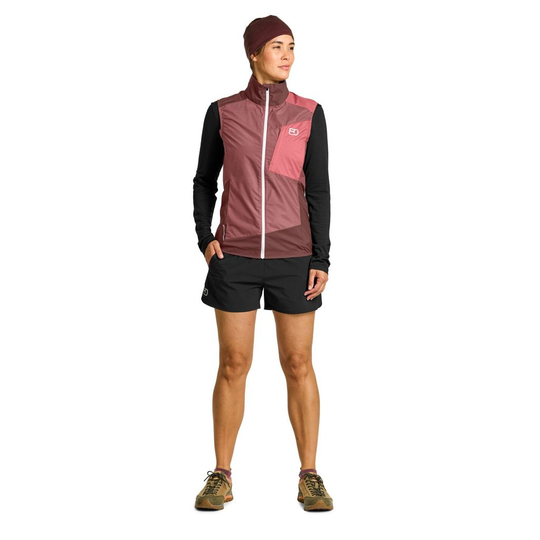 Women's windbreaker vest, lightweight, wind-resistant, Merino wool, pink design, outdoor wear.