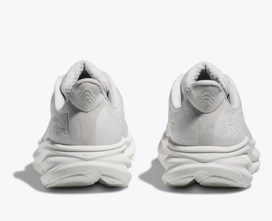 White Clifton 9 shoes, rear view with reflective heel panel and streamlined design.