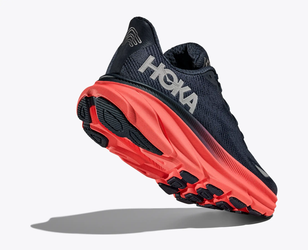 HOKA Clifton 9 GTX running shoe with GORE-TEX, enhanced traction, and red sole.